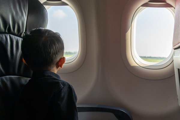 What are the best practices for handling homesickness in UK athletes at training camps?