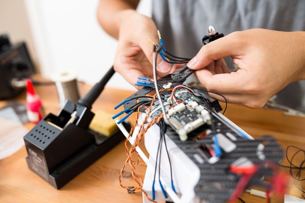 How can UK sports clubs use drone footage to analyze and improve team tactics?